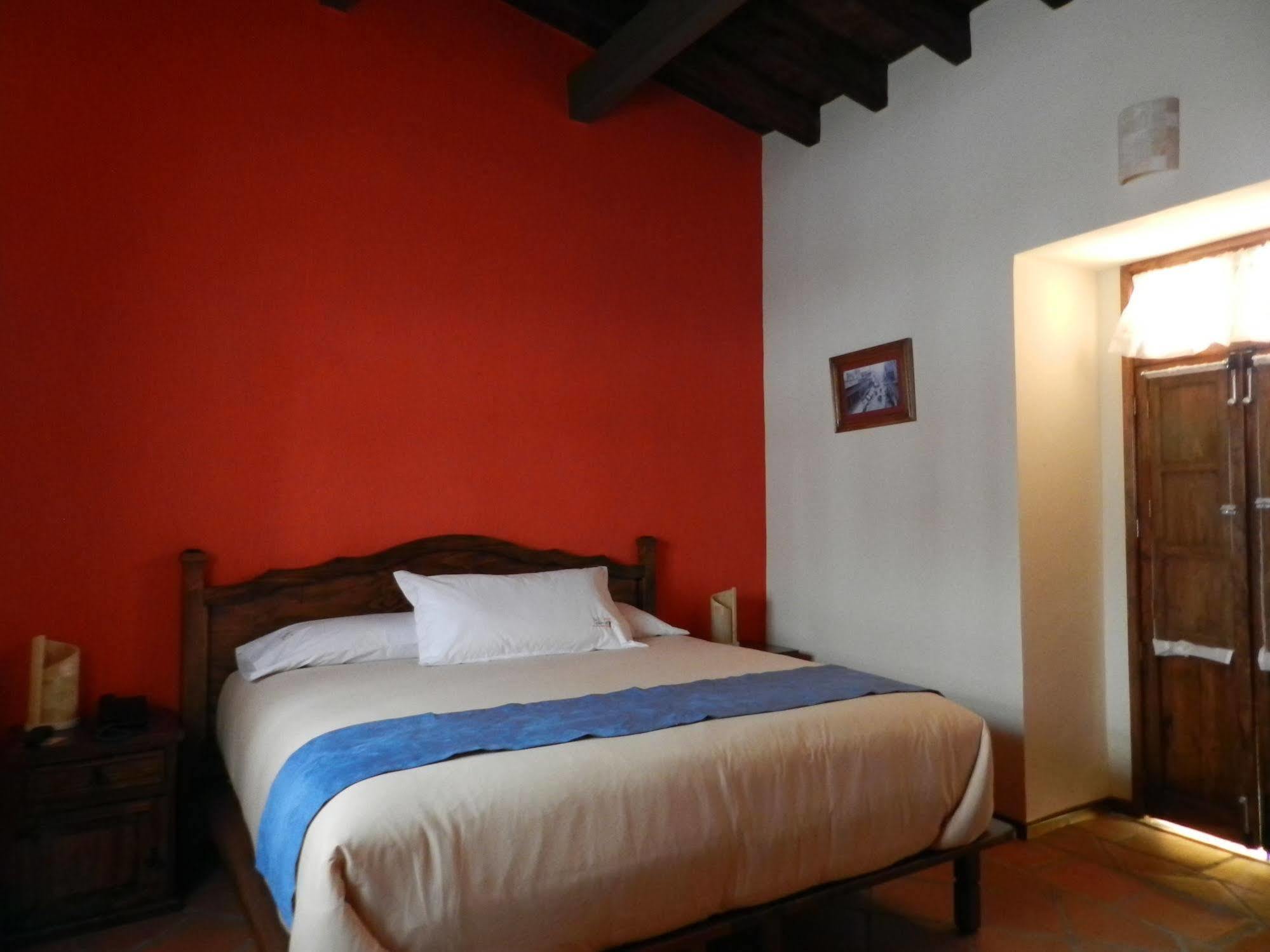 Collection O Al Otro Lado Del Rio, Puebla Hotel Kültér fotó A room at the hotel