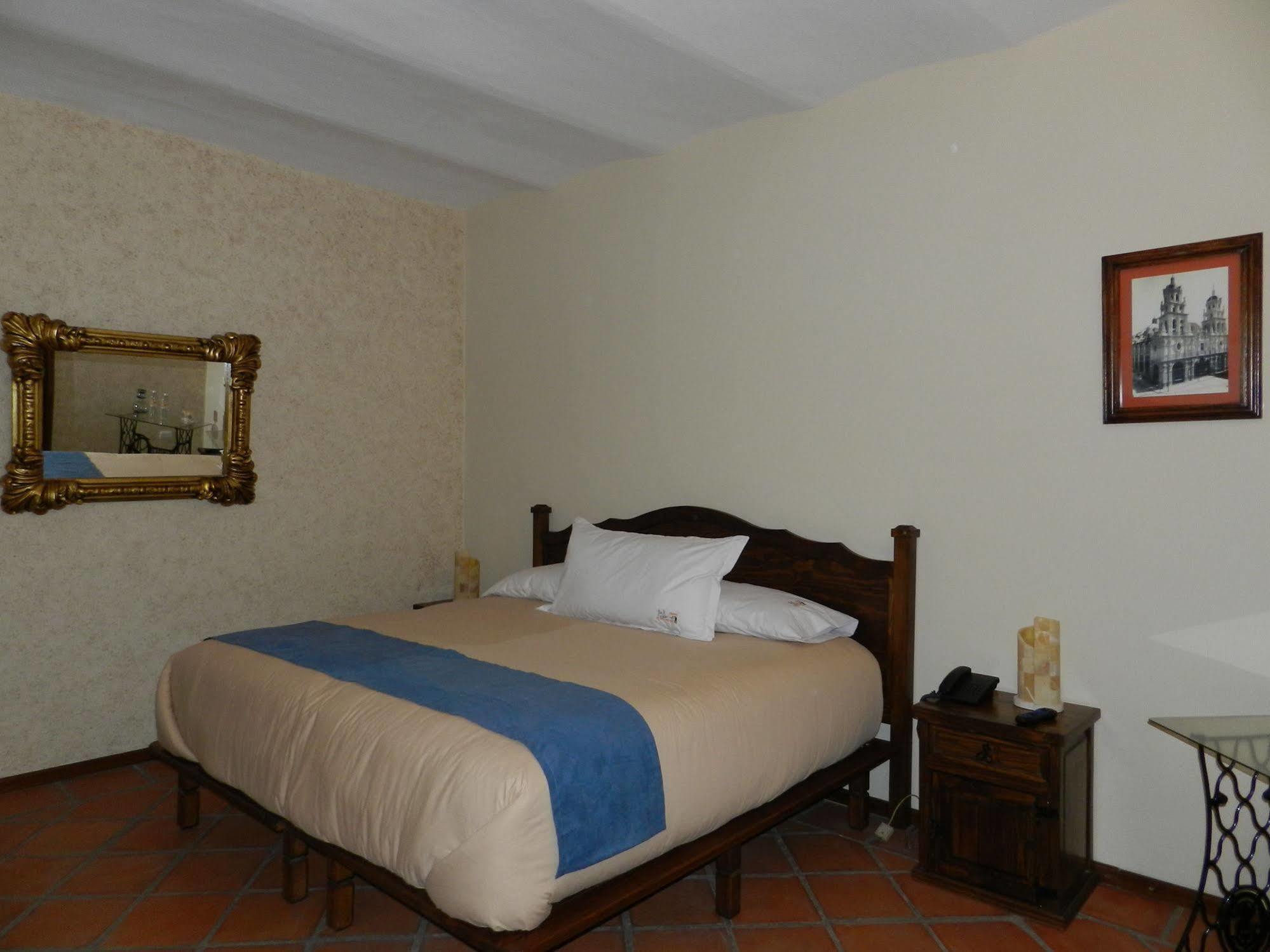 Collection O Al Otro Lado Del Rio, Puebla Hotel Kültér fotó A room at the hotel